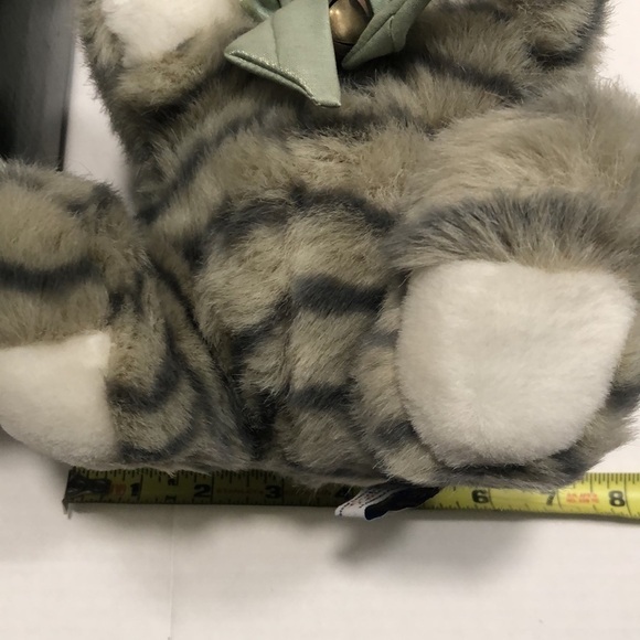 Geppeddo porcelain doll with a cat outfit that is striped and sage bow with bell - Picture 6 of 8